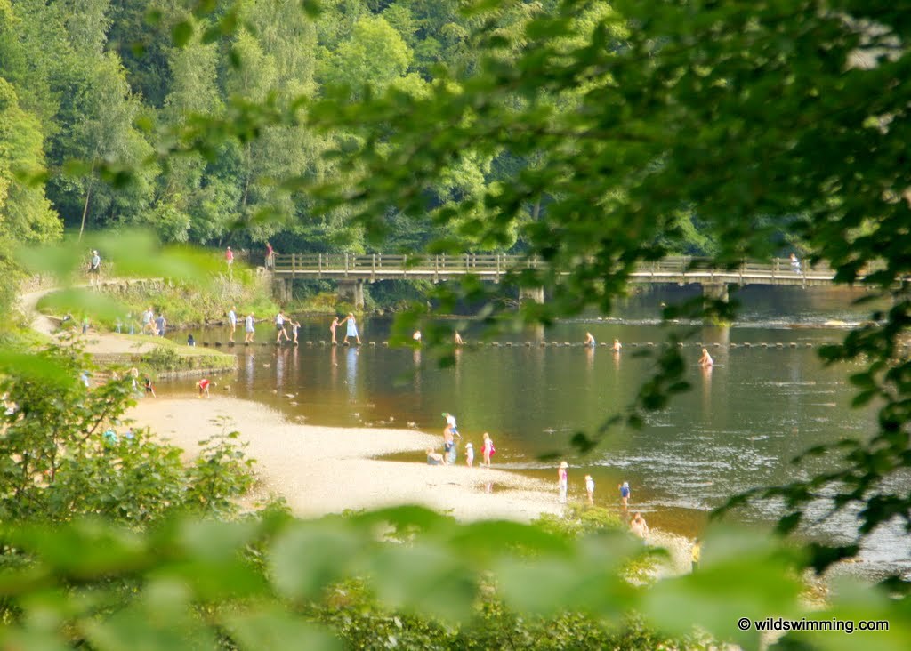 People having fun around the River Wharfe, Bolton Abbey.