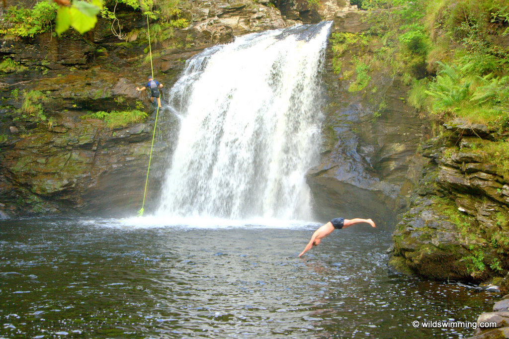 A man taking a dive in Rob Roy's Bathtub.